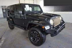 Jeep Wrangler Unlimited Sahara salvage cars for sale: 2014 Jeep Wrangler Unlimited Sahara