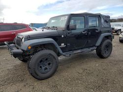 Jeep Wrangler Unlimited Sport salvage cars for sale: 2011 Jeep Wrangler Unlimited Sport