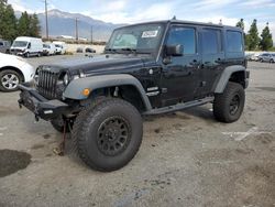 Jeep Wrangler Unlimited Sport salvage cars for sale: 2016 Jeep Wrangler Unlimited Sport