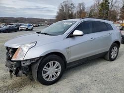 Cadillac salvage cars for sale: 2011 Cadillac SRX