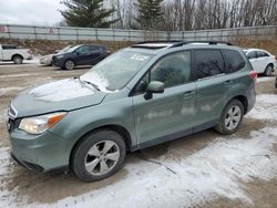 Subaru salvage cars for sale: 2014 Subaru Forester 2.5I Premium