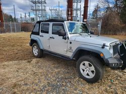 Jeep salvage cars for sale: 2011 Jeep Wrangler Unlimited Sport