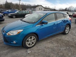 Ford Focus salvage cars for sale: 2012 Ford Focus SEL