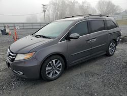 Honda Odyssey Touring salvage cars for sale: 2014 Honda Odyssey Touring