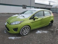 Salvage cars for sale from Copart Leroy, NY: 2011 Ford Fiesta SE