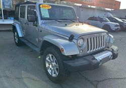 Jeep Wrangler salvage cars for sale: 2017 Jeep Wrangler Unlimited Sahara