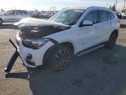 BMW x1 salvage cars for sale: 2018 BMW X1 SDRIVE28I