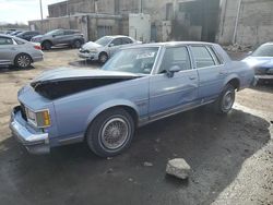 Oldsmobile salvage cars for sale: 1984 Oldsmobile Cutlass Supreme Brougham