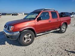 Salvage trucks for sale at Taylor, TX auction: 2000 Niss Frontier Crew Cab XE