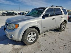Salvage cars for sale from Copart Haslet, TX: 2009 Ford Escape Hybrid